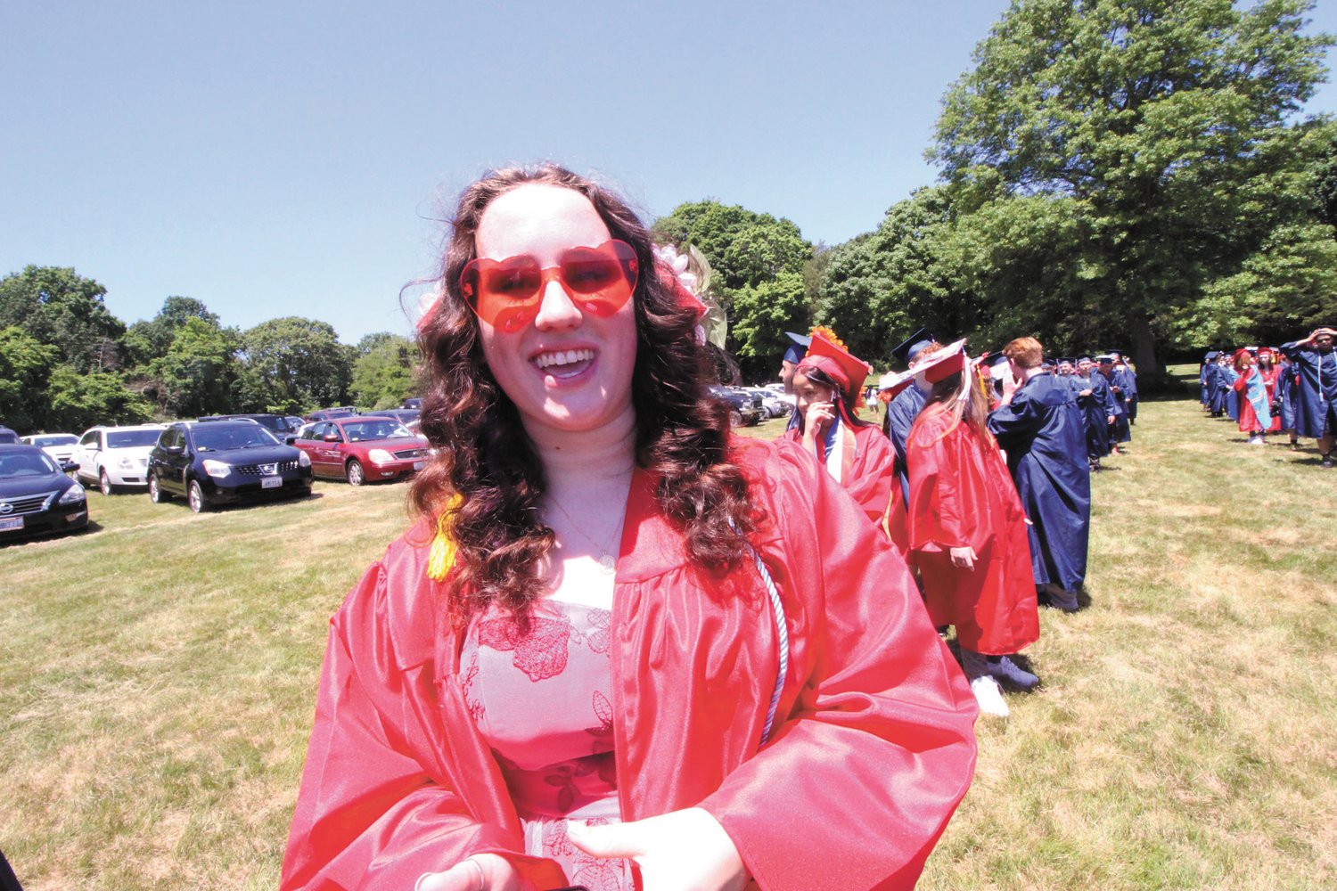 SHOWING HER LOVE: Toll Gate grad Charity McIntosh wore heart-shaped pink glasses – her mother bought them – to her graduation. (Warwick Beacon photos)